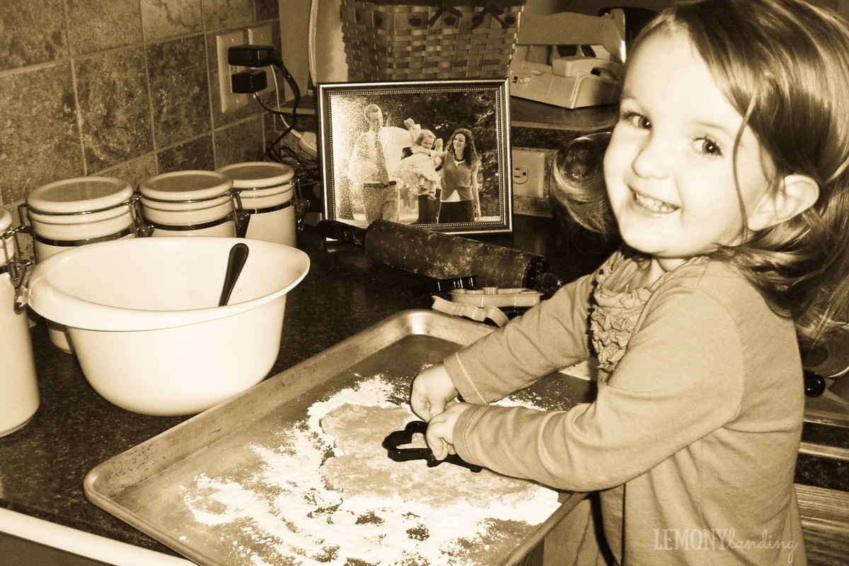 Back in the day, two-year-old Maggie cutting out Halloween cookies